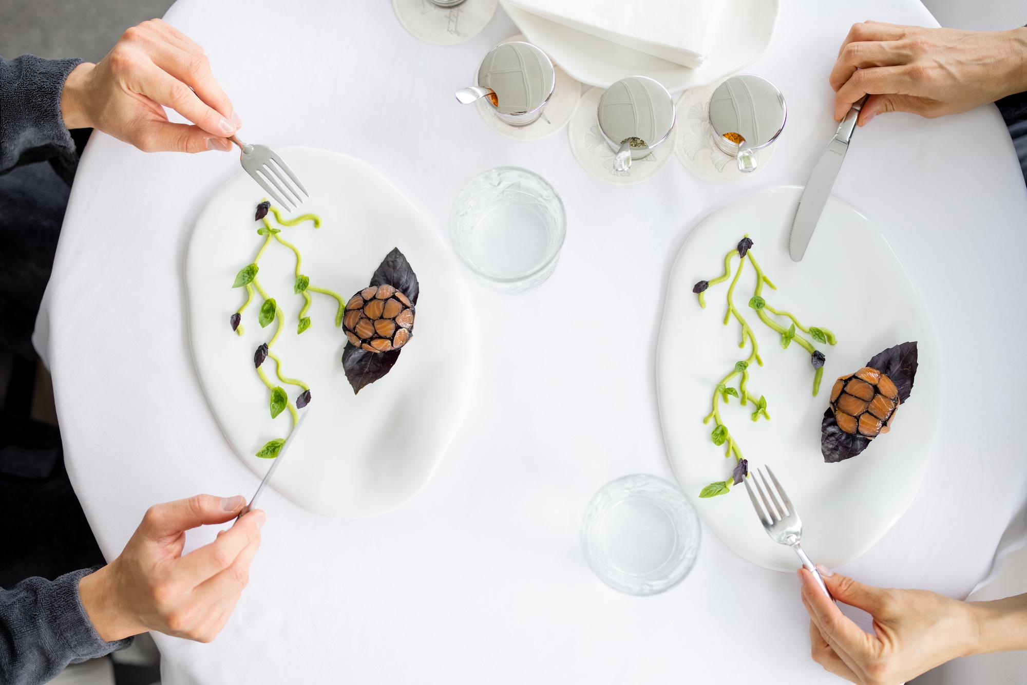 Workshop participants plating dishes