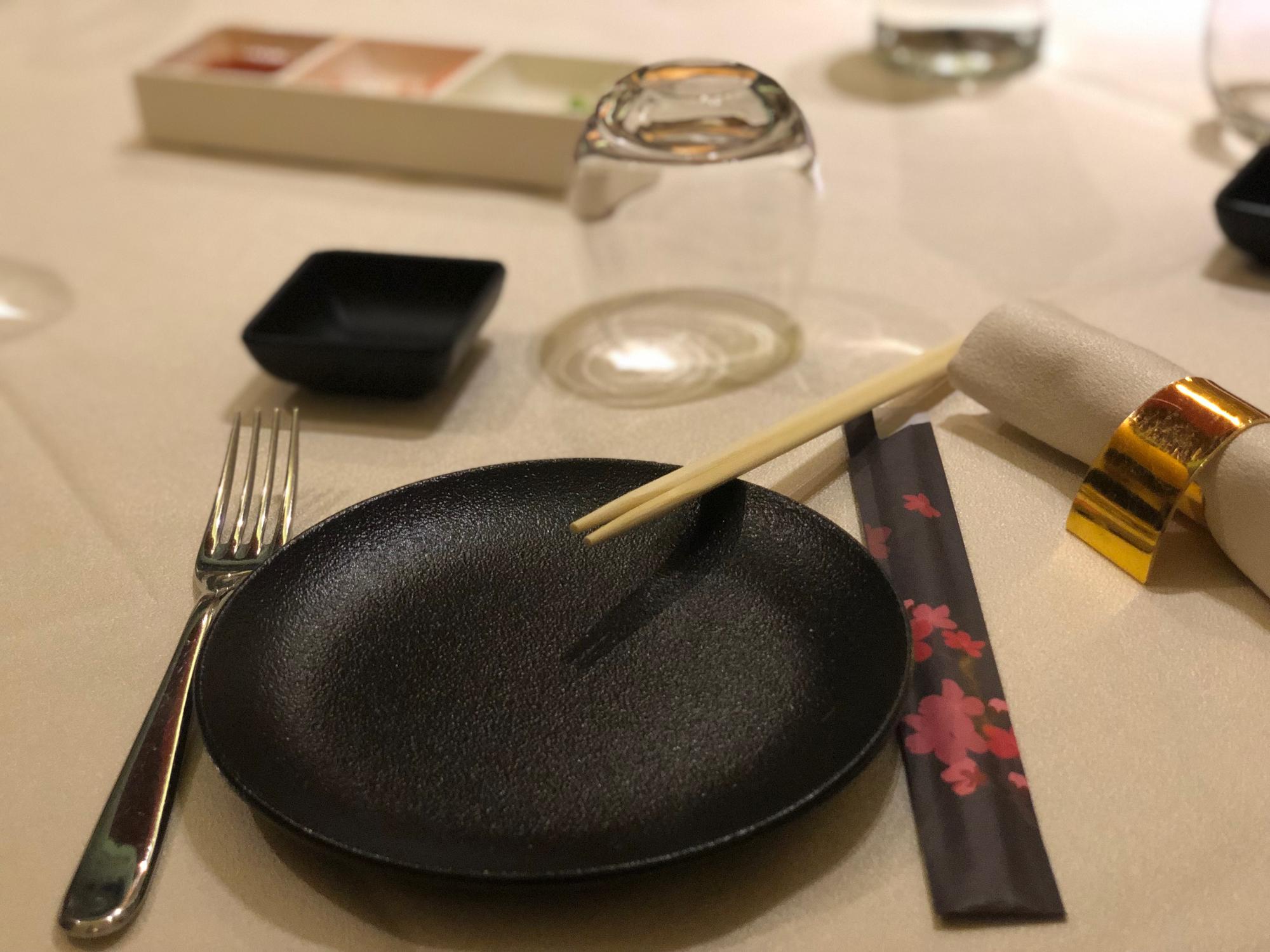 Table with plated dishes and utensils